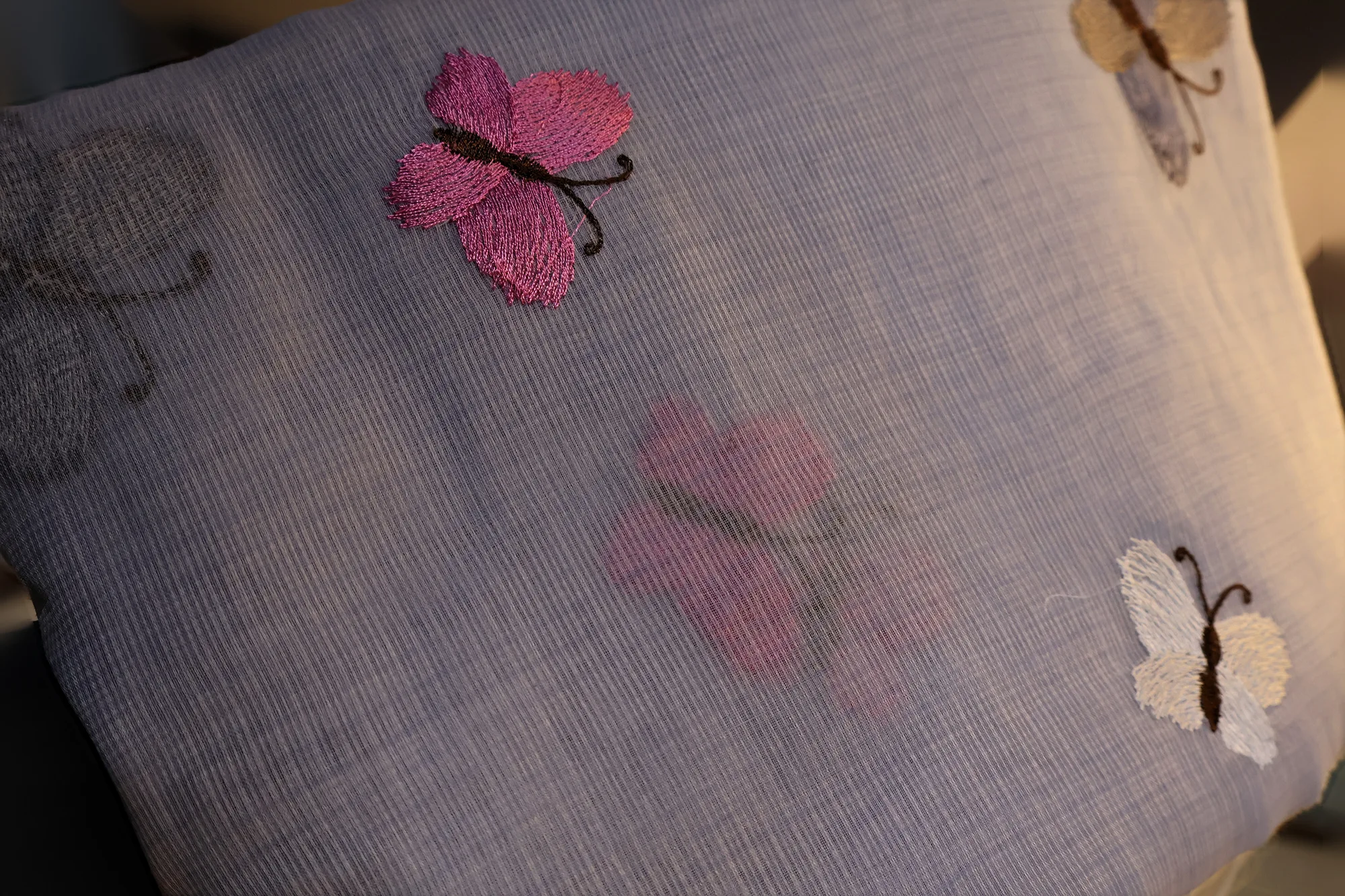 Butterfly Bloom - Kota: a detail of the work. Kota cotton.