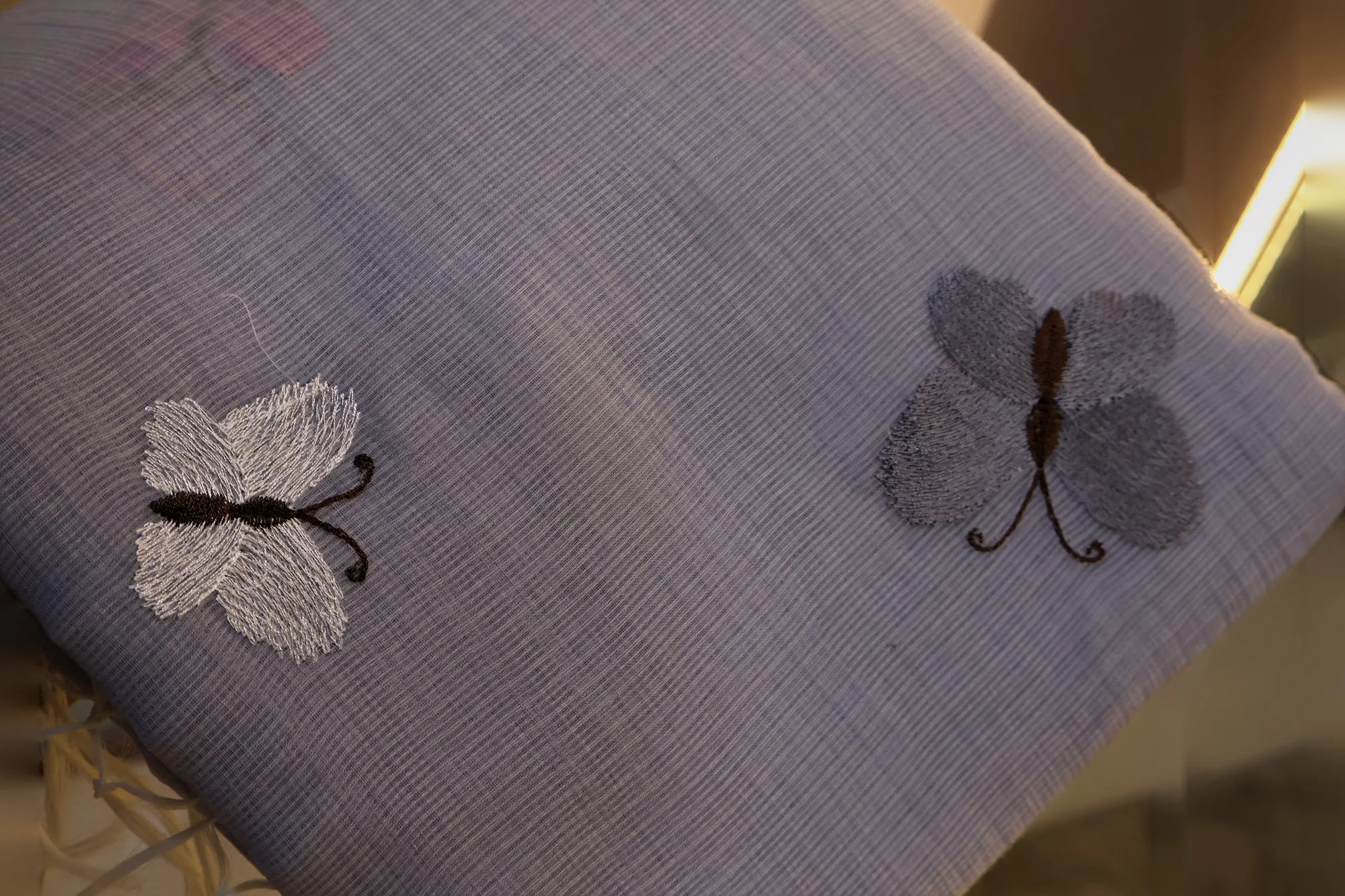 Butterfly Bloom - Kota: a detail of the work. Kota cotton.