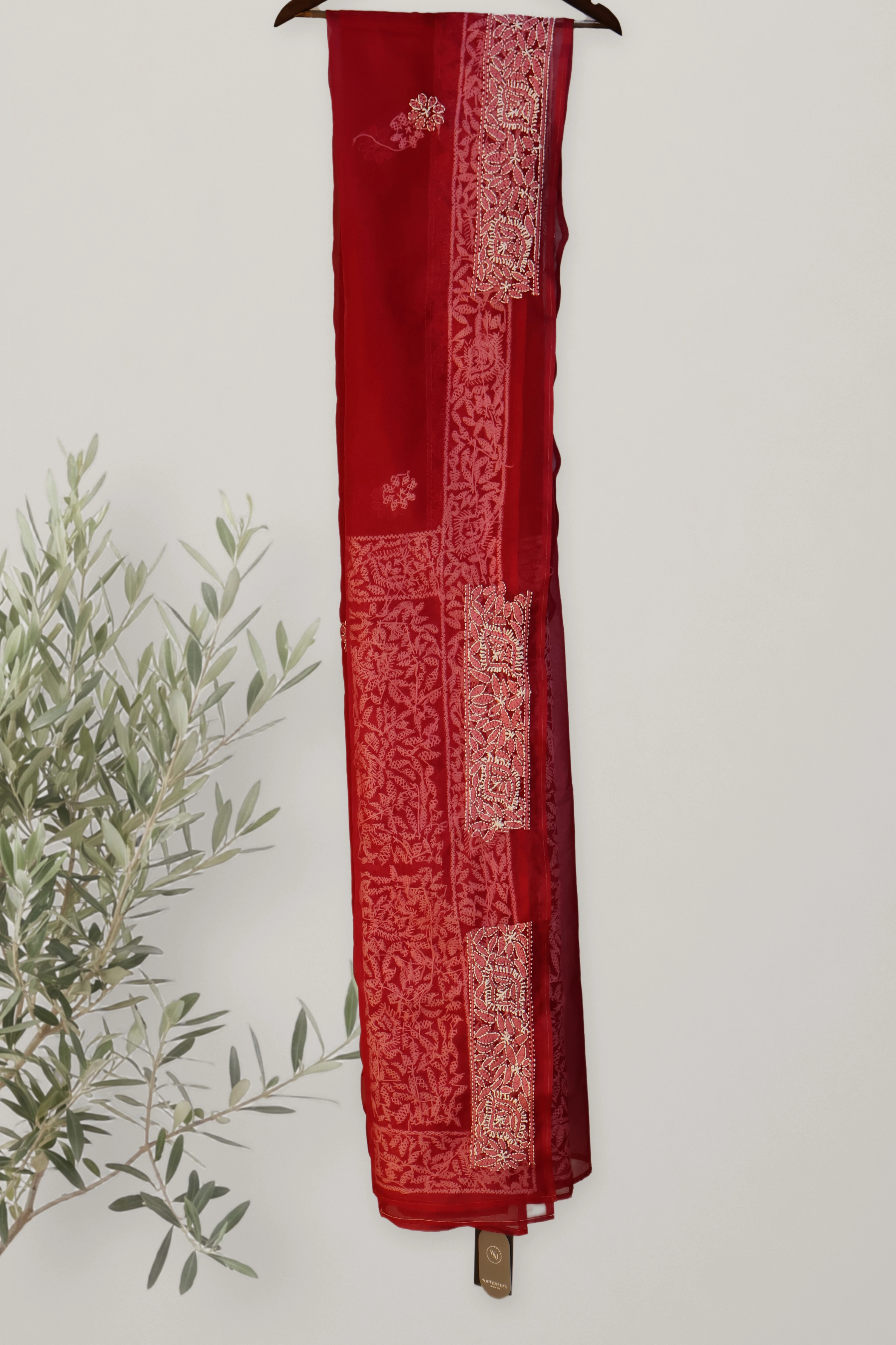 Kantha - Chikankari Organza: a detail of the work. Organza.