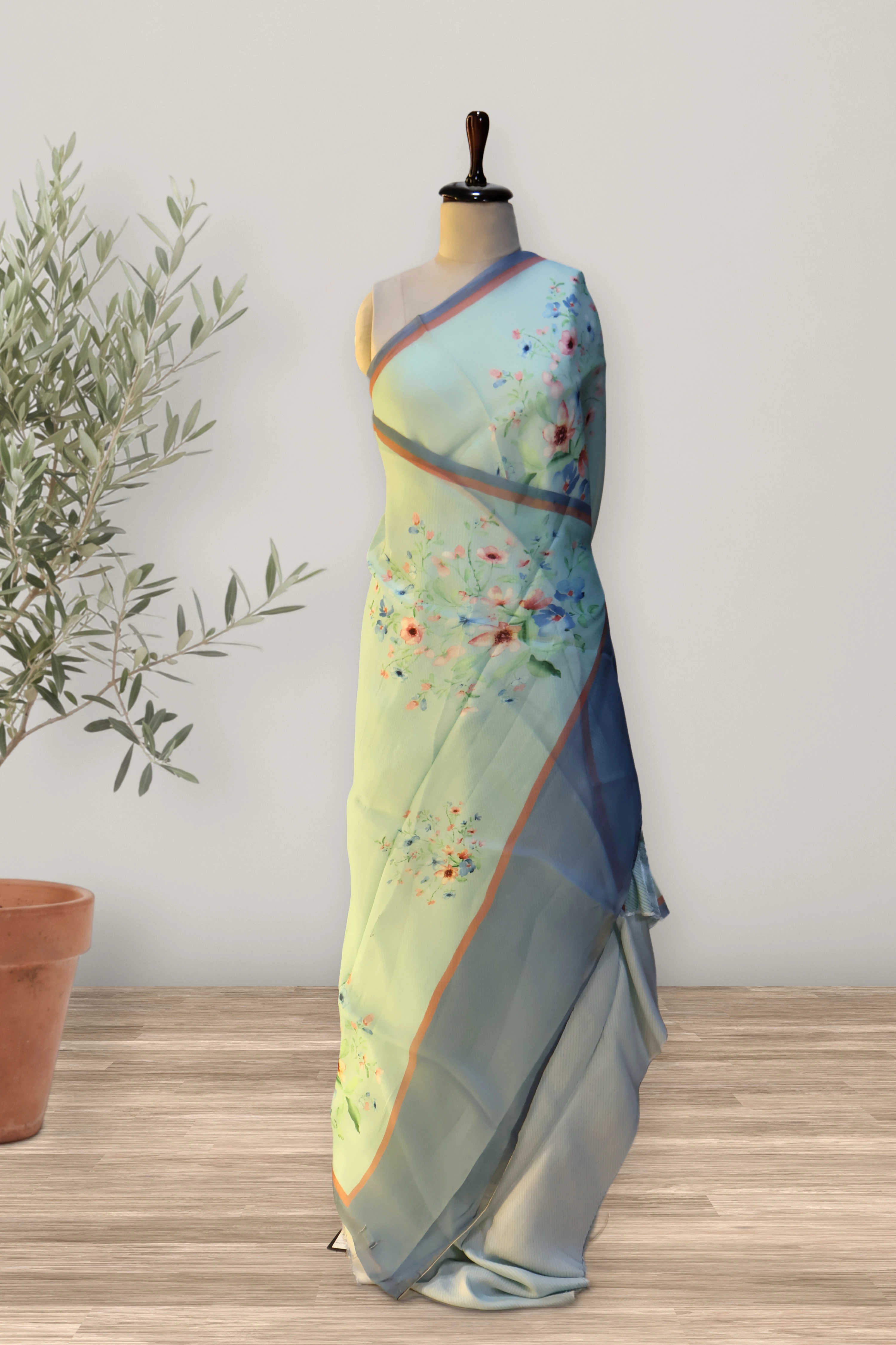 Alia Floral Organza Saree: a detail of the work. Organza.